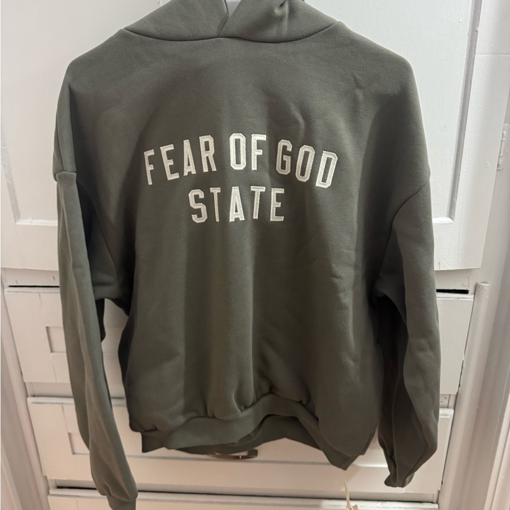 Fear of God ESSENTIALS Kids Moss '90s Fit Fleece Hoodie.